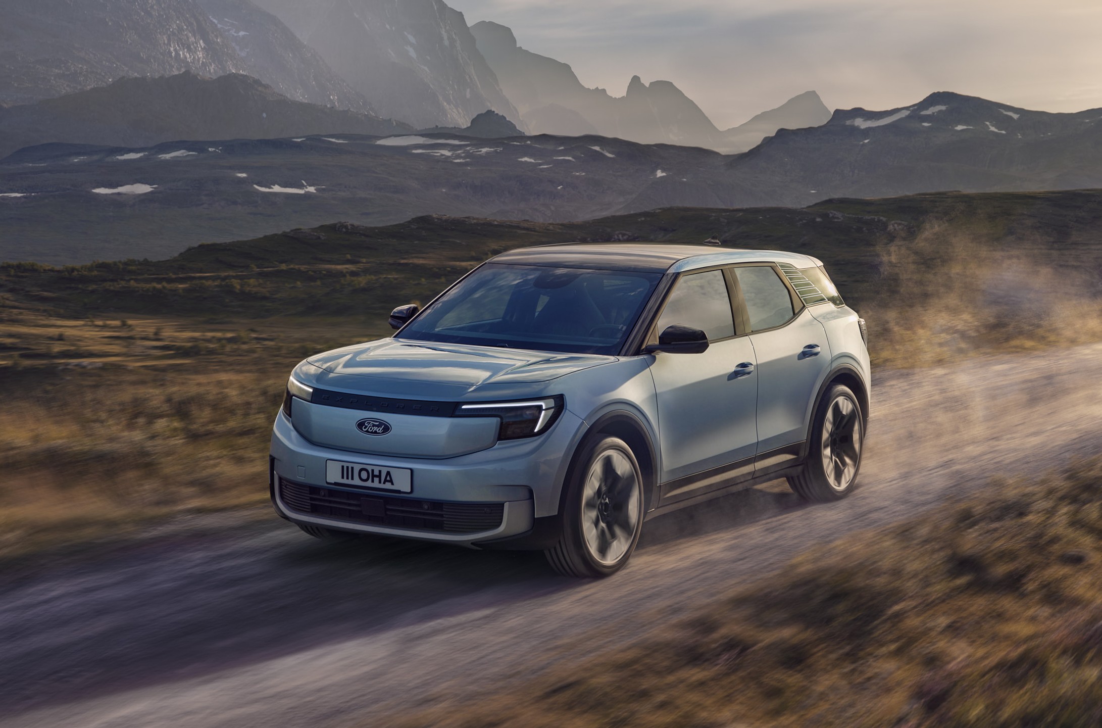 Ford Explorer driving on mountainous road