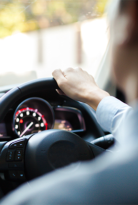 Man behind steering wheel