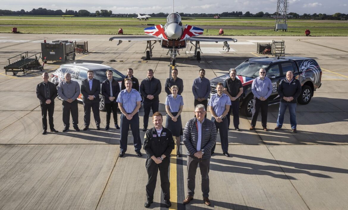 Team and clients in front of Typhoon Jet